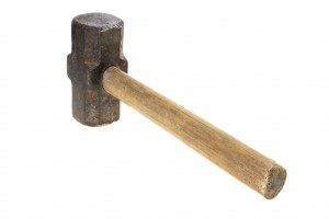 Sledgehammer testing a padlock